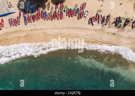 Aerial view of fishing boats in Tarrafal beach in Santiago island in Cape Verde - Cabo Verde Stock Photo