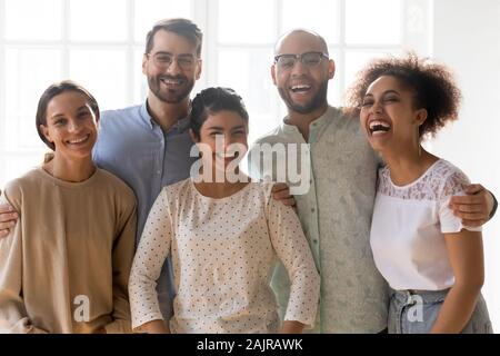 Portrait of happy multiethnic friends posing for photo Stock Photo