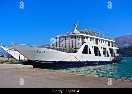 One of the local ferry boats, which provides a service between Argostoli and Lixouri, the main town on the peninsula of Paliki. leaving Argostoli. Stock Photo