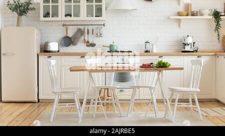 Modern cozy empty light domestic kitchen interior Stock Photo