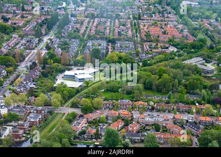 Aerial view of Amsterdam city outside Schiphol airport during flight landing Stock Photo