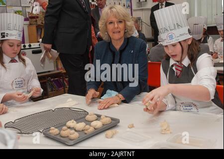 The Prince of Wales and the Duchess of Cornwall attending the launch of 'chefs adopt a school' programme at St George's primary school in Mayfair. Stock Photo