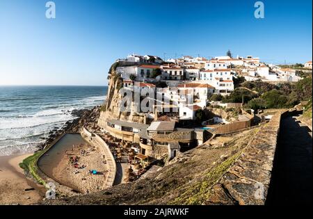 Town on a sun-drenched cliff near Colares Stock Photo