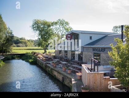 A view of the Tap and Kitchen Restaurant and Bar on Oundle Wharf in Oundle from the Oundle North Bridge - 2016 Stock Photo