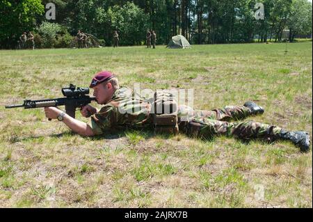 A member of 2 Para parachute regiment due to be deployed to Afghanistan in September pictured with the recently introduced Sharpshooter rifle. Stock Photo