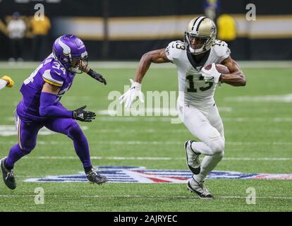 New Orleans, LA, USA. 5th Jan, 2020. New Orleans Saints wide receiver Michael Thomas (13) tries to outrun Minnesota Vikings defensive back Andrew Sendejo (34) during NFL Wild Card Playoff action between the New Orleans Saints and the Minnesota Vikings at the Mercedes Benz Superdome in New Orleans, LA. Jonathan Mailhes/CSM/Alamy Live News Stock Photo
