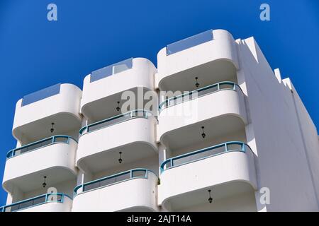 part of a white building in Spain with balconies Stock Photo