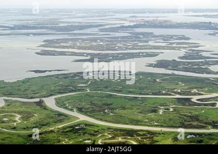 Elevated view of the northern stretch of the Venetian Lagoon.  To the left is the island of Torcello, to the right is Burano. Stock Photo