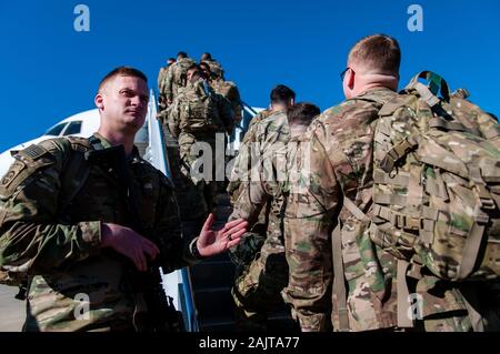 January 5, 2020, Pope Army Airfield, North Carolina, USA: U.S. Army paratroopers from the 1st Brigade Combat Team, 82nd Airborne Division, board an aircraft at Pope Army Airfield for deployment to the U.S. Central Command area of operations in response to increased threat levels against U.S. personnel and facilities in the area. Today's deployment follows the Jan. 1 deployment of a division infantry battalion; the Jan. 2 U.S. drone strike in Baghdad, Iraq that killed Qasem Soleimani, the head of Iran's Islamic Revolutionary Guard Corps-Quds Force, and elements of the division that deployed Jan Stock Photo