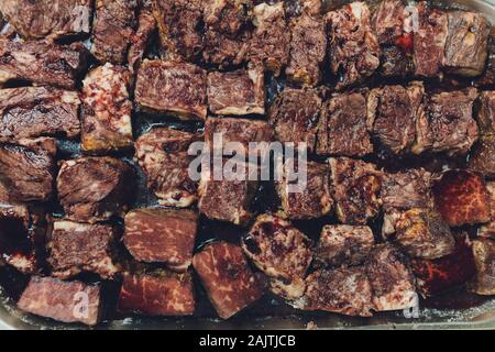 Three fresh raw Prime Black Angus Tenderloin beef steaks on stone background. Selected focus Stock Photo