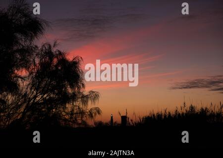 Cape Trafalgar lighthouse at sunset, Andalucía, Spain Stock Photo