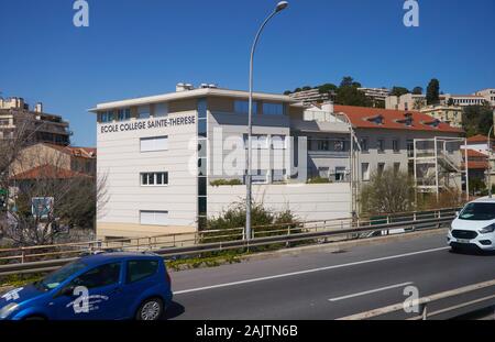 Nice, France - April 05, 2019: Photo taken while traveling by train Cannes-Monaco. View of School and Middle School Sainte-Therese. Stock Photo