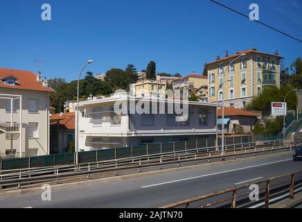 Nice, France - April 05, 2019: Photo taken while traveling by train Cannes-Monaco. View buildings on Voie Pierre Mathis highway. Stock Photo
