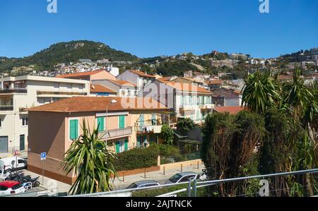 Nice, France - April 05, 2019: Photo taken while traveling by train Cannes-Monaco. View of Rue du Dr Ciais. Stock Photo