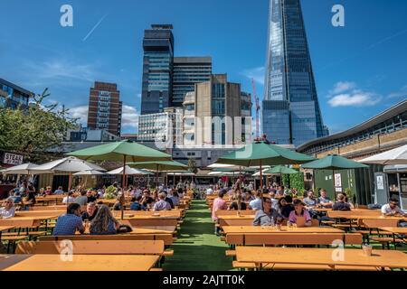 LONDON, UNITED KINGDOM - AUGUST 22: This is Vinegar Yard, a popular market which has street food vendors and vintage clothes stalls on August 22, 2019 Stock Photo