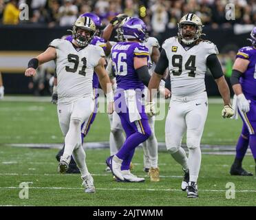 New Orleans, USA. 27th Aug, 2023. Houston Texans quarterback C.J. Stroud  (7) attempts a pass while facing a heavy pass rush from New Orleans Saints  defensive ends Tanoh Kpassagnon (92) and Carl