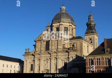 The low winter sun lights Our Lady of St Peters church, which is situated on St Peters Square, in Ghent, Belgium. With copy space. Stock Photo