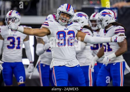 Buffalo Bills defensive end Darryl Johnson 92 looks on from the