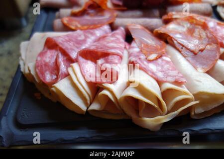 Various Sliced Processed Cold Meats on Display in the Buffet at the Azul Beach Resort Hotel, Puerto Morelos, Riviera Maya, Cancun, Mexico. Stock Photo