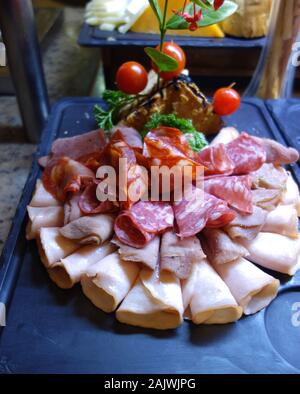 Various Sliced Processed Cold Meats on Display in the Buffet at the Azul Beach Resort Hotel, Puerto Morelos, Riviera Maya, Cancun, Mexico. Stock Photo