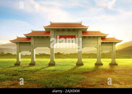 Chinese pavilion gate with red roof with landscapes view and blue sky background Stock Photo