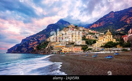 Positano, a town on Amalfi coast, Naples, Italy, dramatically set on a steep cliff between Mediterranean sea and mountains, is a famous travel destina Stock Photo
