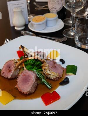 Garlic Lamb with Honey and Rosemary Sauce Stock Photo