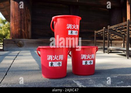 Fire buckets at Toji temple in Kyoto, Japan. Stock Photo