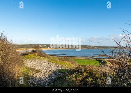 Port Eynon Salt House and the Salt house spit. Port Eynon, Gower Peninsula, Wales. UK Stock Photo