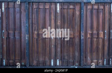 Wooden walls and iron bars Used as background Stock Photo
