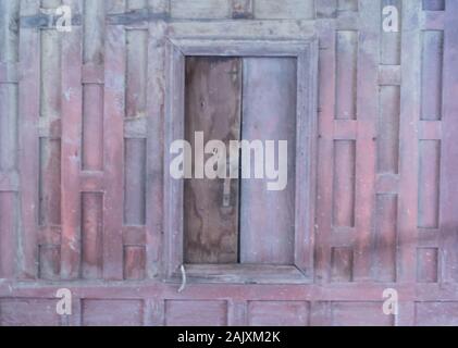 Wooden walls and iron bars Used as background Stock Photo