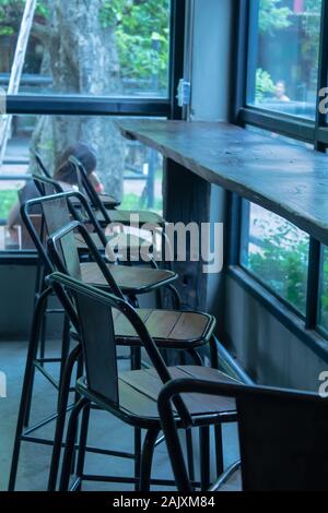 Wooden tables and chairs Stock Photo