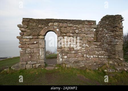 The ruins of St Patrick’s Chapel in winter situated near the vilage of Heysham close to Throbshaw, or Throbshire, Point on the edge of Morecambe Bay. Stock Photo