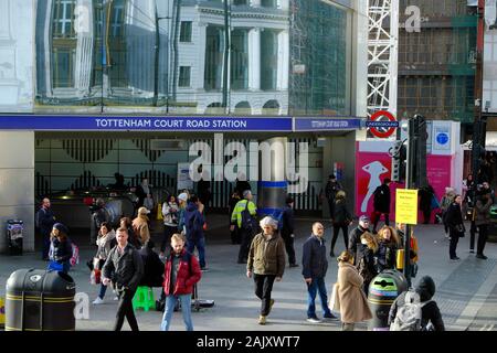 People outside the entrance to Tottenham Court Road underground tube station in Oxford Street London England UK  KATHY DEWITT Stock Photo