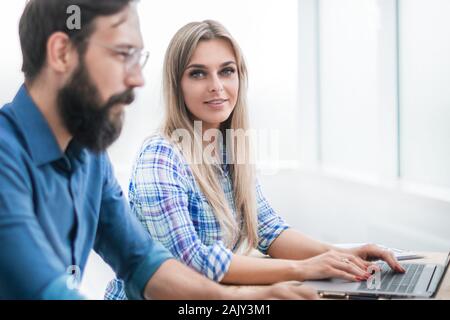 employees work together in a modern office Stock Photo