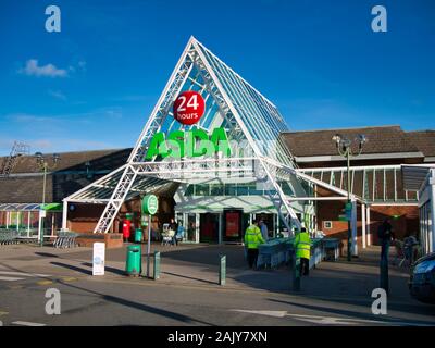 The frontage of a store of the Walmart owned ASDA British supermarket chain, located at an out of town retail park in the North of England. Stock Photo