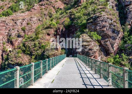Gorges de Daluis or Chocolate canyon as it is called by locals because of the rocks color formed by Var river. Provence-Alpes-Cote d'Azur region of Fr Stock Photo