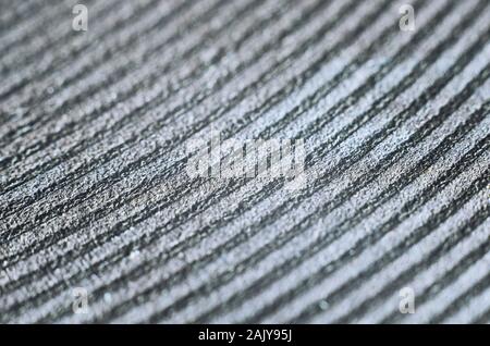 Macro of old and damaged metal heating element from electric range. Abstract repeating pattern of rings Stock Photo