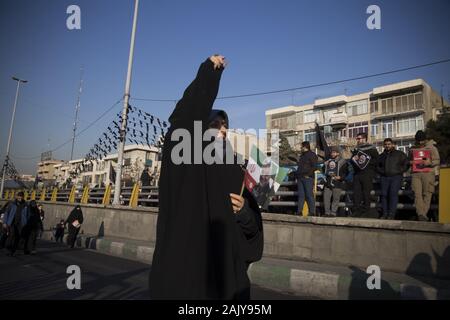 Tehran, Iran. 6th Jan, 2020. Iranians attend the funeral ceremony of slain Iranian Revolutionary Guards Corps (IRGC) Lieutenant general and commander of the Quds Force Qasem Soleimani and of other victims in Tehran, Iran. Soleimani was killed in a targeted US airstrike on 03 January 2020 in Baghdad, Iraq. The processions mark the first time Iran honored a single man with a multi-city ceremony. Not even Ayatollah Ruhollah Khomeini, who founded the Islamic Republic, received such a processional with his death in 1989. Credit: Rouzbeh Fouladi/ZUMA Wire/Alamy Live News Stock Photo