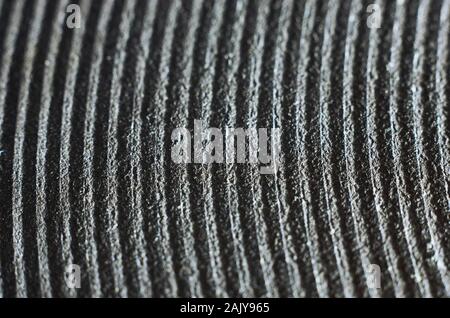 Macro of old and damaged metal heating element from electric range. Abstract repeating pattern of rings Stock Photo