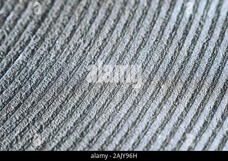 Macro of old and damaged metal heating element from electric range. Abstract repeating pattern of rings Stock Photo