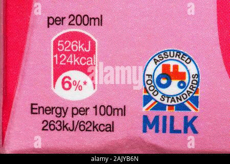 little red tractor logo symbol on carton of Moo Milk strawberry flavoured milk Stock Photo