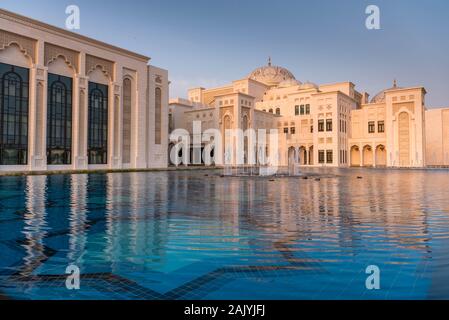 Abu Dhabi: Qasr Al Watan (Palace of the Nation), Presidential Palace in Abu Dhabi, outdoor, exterior, at sunset, reflection in water, nobody Stock Photo