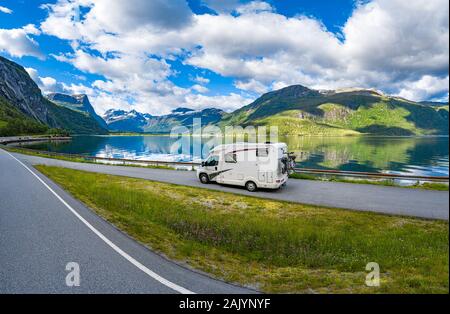 Family vacation travel RV, holiday trip in motorhome, Caravan car Vacation. Beautiful Nature Norway natural landscape. Stock Photo