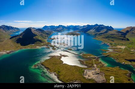 Fredvang Bridges Panorama. Lofoten islands is an archipelago in the county of Nordland, Norway. Is known for a distinctive scenery with dramatic mount Stock Photo