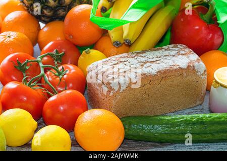 Green grid with healthy food on the kitchen table Stock Photo