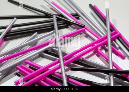 Wild drinking straws on the table, looks like a Mikado game Stock Photo