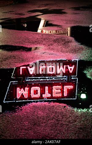 Neon sign reflection, Historic Motel La Loma, Route 66, Santa Rosa, New Mexico USA Stock Photo