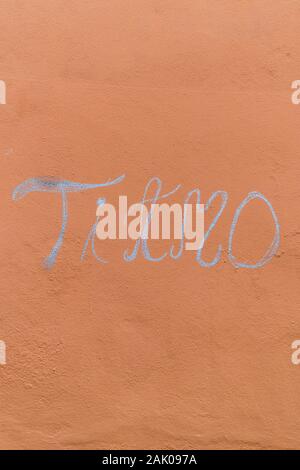 I love you in Italian. Ti amo written on a wall with chalk. Stock Photo