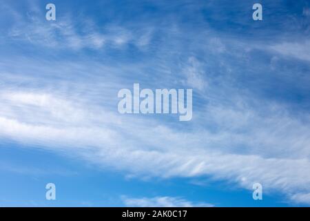 Blurred white clouds on the sky background. Stock Photo